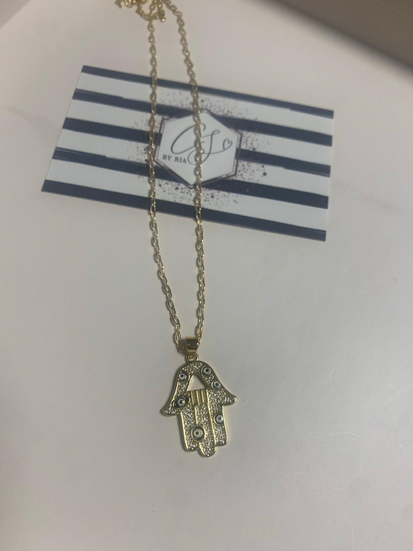 Gold Hamsa with Evil Eyes Necklace